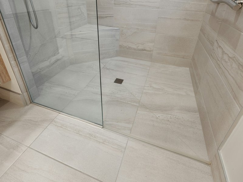 Grey tile floors in a bathroom